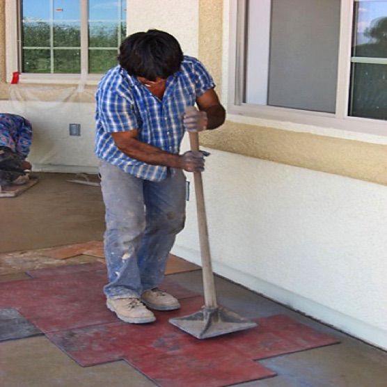 Front entrance patio being stamped